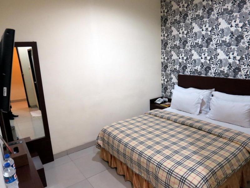 Vindhika Hotel Makassar Phòng bức ảnh
