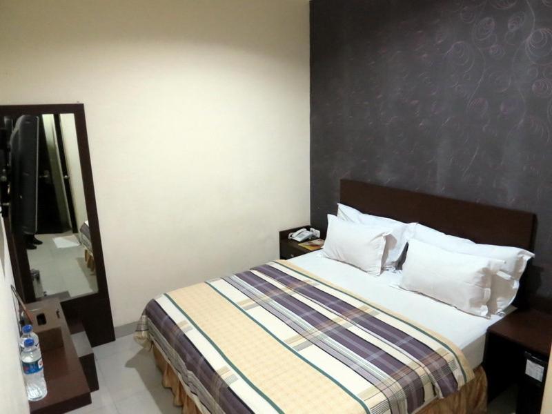 Vindhika Hotel Makassar Phòng bức ảnh